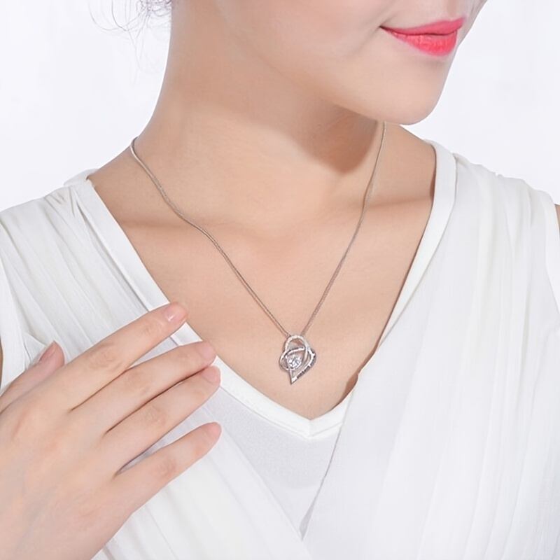 Een elegante ketting met harth - Women Fashion Over The Years recensie en prijs